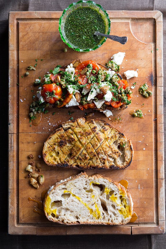 Garlic fried beef tomatoes with capers, goat's cheese & Grandad's mint sauce