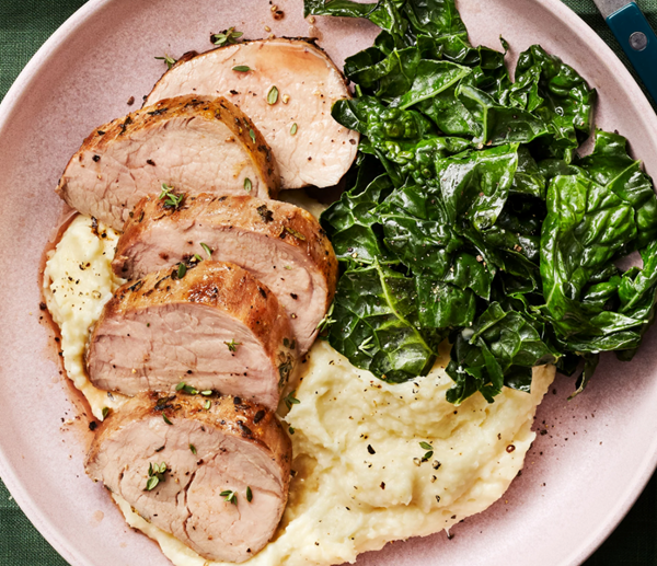 Garlic-herb roast pork tenderloin with parsnip puree & kale