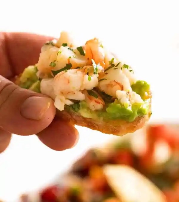 Garlic prawns and avocado crostini