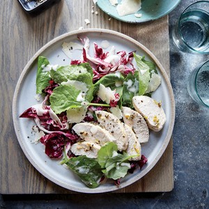 Garlic-sage roasted chicken with kale and radicchio Caesar salad