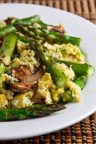 Garlic scape pesto scrambled eggs with asparagus and mushrooms
