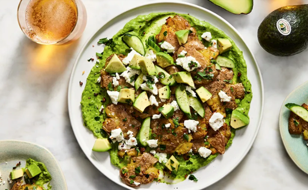 Garlic smashed potatoes with avocados & feta