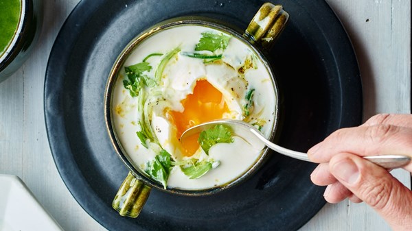 Garlic soup with potatoes and poached eggs