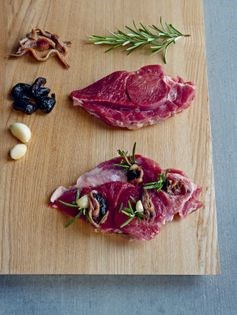 Garlic-studded lamb leg steak