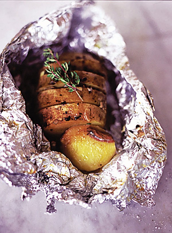 Garlic, thyme and anchovy baked potatoes