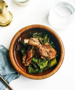 Garlicky pork ribs soup with tamarind and greens