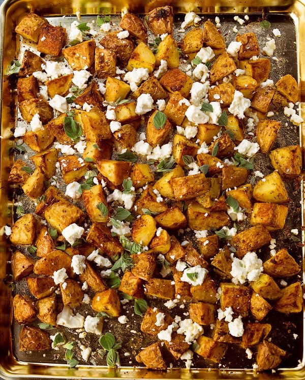 Garlicky roast potatoes with oregano and feta