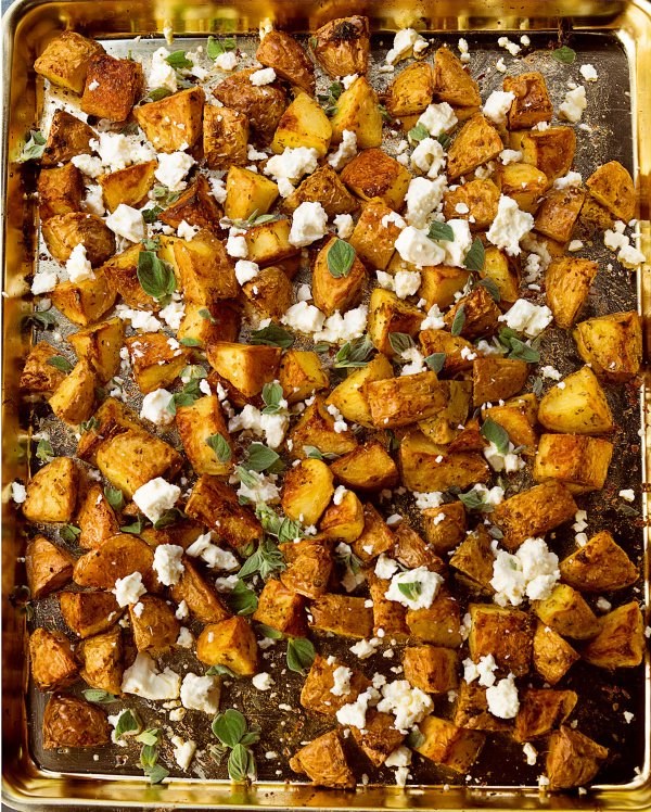 Garlicky roast potatoes with oregano and feta