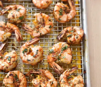 Garlicky roasted shrimp with cumin, ginger, and sesame