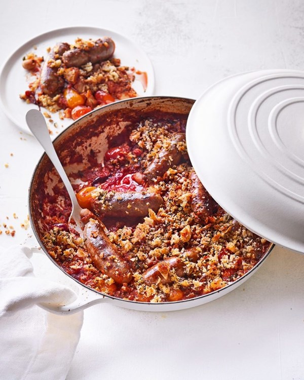 Garlicky sausage, butter bean and tomato bake