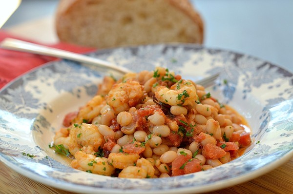Garlicky shrimp with white beans and tomatoes