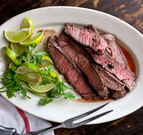 Garlicky, smoky grilled London broil with chipotle chiles