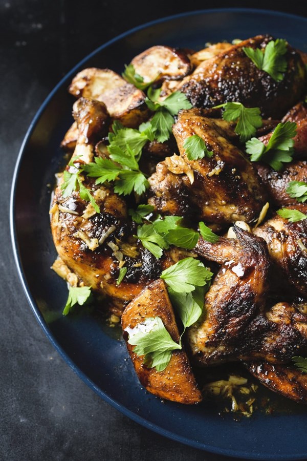 Garlicky spiced chicken and potato traybake with pomegranate molasses