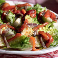 Gem lettuce with anchovies and peppers