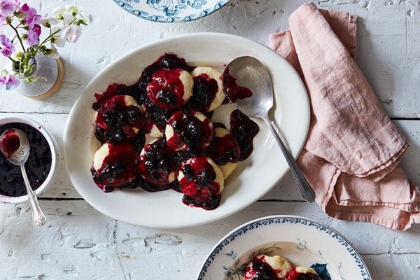 German steamed dumplings with blueberry sauce