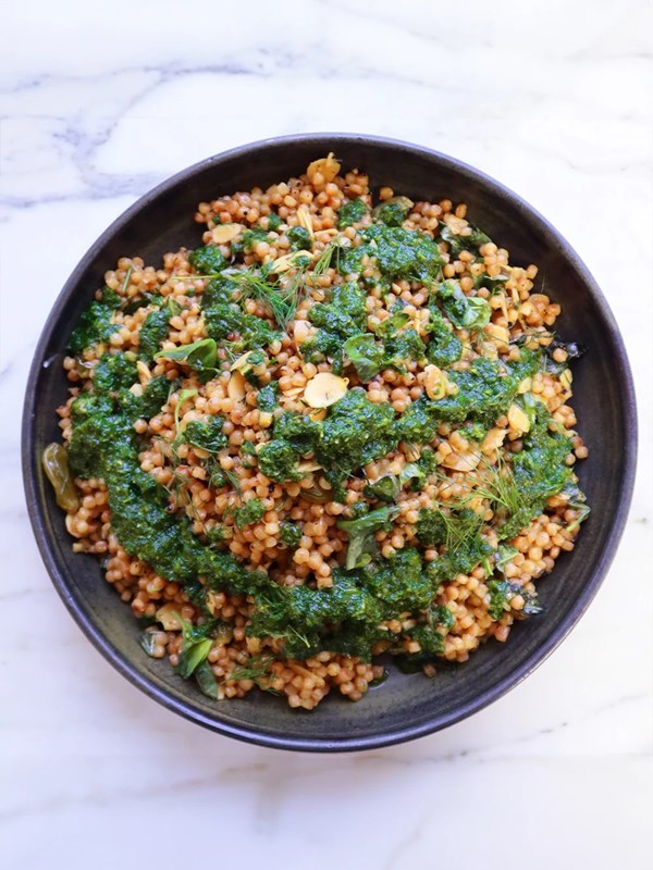 Giant couscous with golden raisins, lemon and almonds