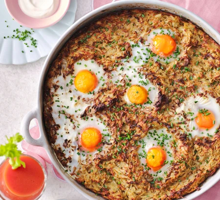 Giant rosti with baked eggs