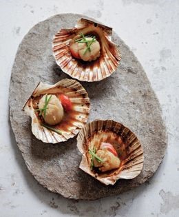 Giant scallop sake poached in shell