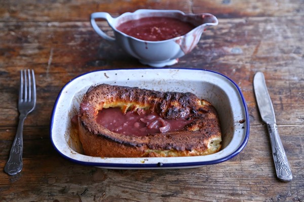 Giant Yorkshire pudding in truffle oil with red wine and shallot gravy
