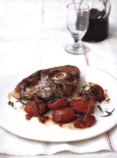 Gigot of lamb with roast Brandywine tomatoes