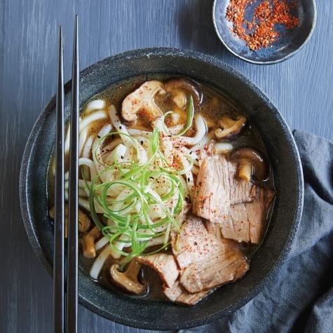 Ginger beef udon noodle bowl with shiitake mushrooms