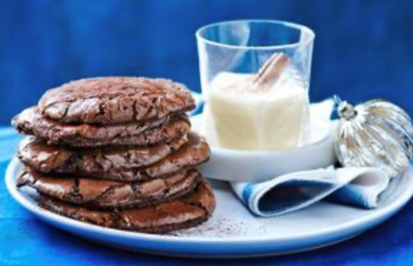 Ginger chocolate meringue cookies with warm brandy custard