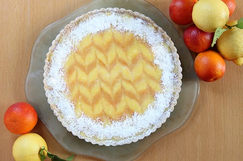 Ginger lemon & bourbon blood orange tart with cardamom almond crust