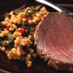 Ginger-marinated leg of lamb with Israeli couscous & kale