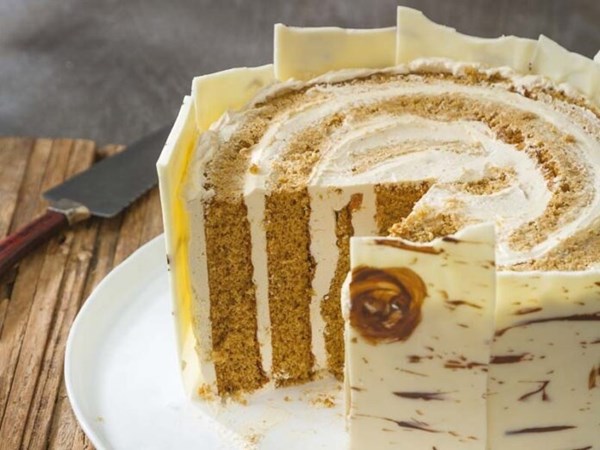 Gingerbread bûche de Noël [molasses simple syrup, brown sugar buttercream, white chocolate bark]