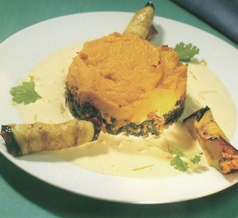 Gingered kale, walnut and pumpkin gratin with lemon-cumin sauce and aubergine-chilli rolls