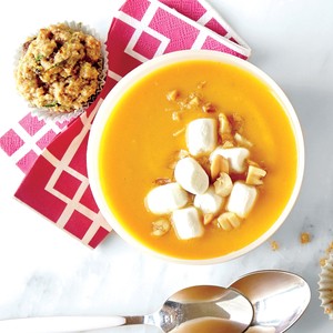 Gingered sweet potato soup with marshmallow and peanut topper