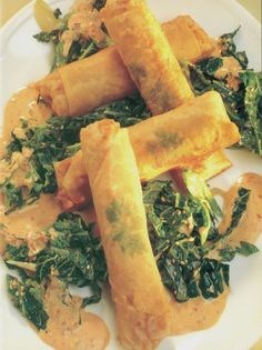 Gingered sweet potato spring roll with sesame-fried cabbage and a coconut-chilli cream