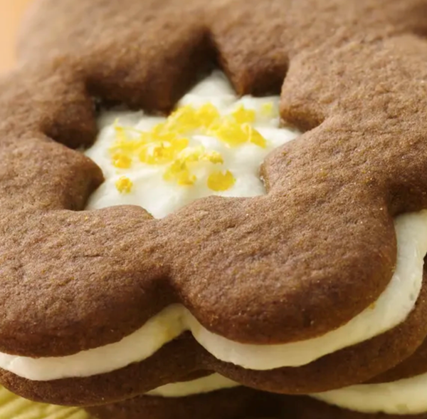 Gingersnap sandwich cookies with lemon buttercream frosting