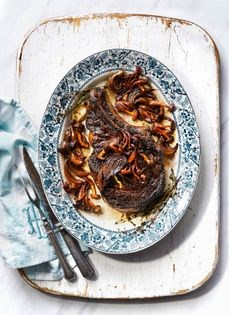 Girl boss steak with confit onions and mushrooms 