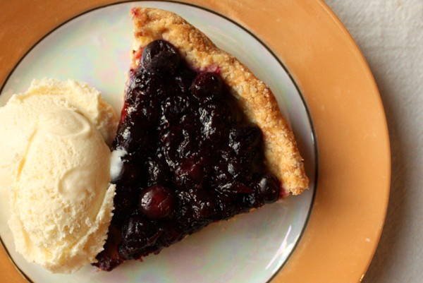 Glazed blueberry tart with lime curd