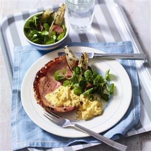 Glazed gammon steaks with scrambled eggs and chicory salad