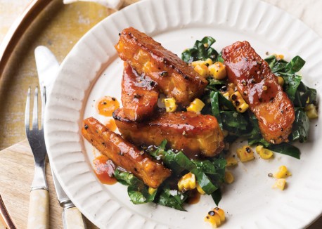 Glazed maple-mustard tempeh strips with collards
