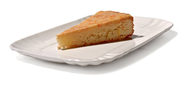 Glazed orange-flower madeleine cake