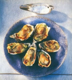 Glazed oysters on crushed potatoes with parsley & Maytag blue