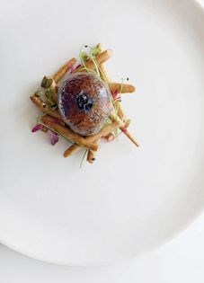 Glazed partridge breast with toasted nori seaweed, braised chestnut mushrooms and morel butter
