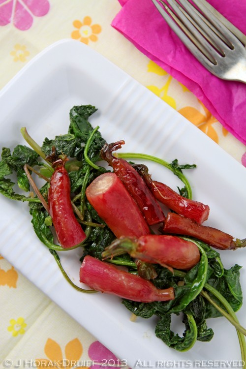 Glazed radishes on garlicky radish greens