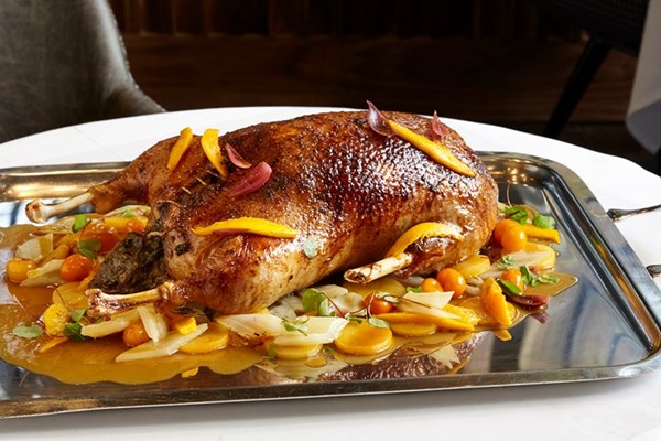 Glazed roast goose, citrus, swede and friends