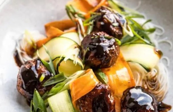 Glossy soy turkey meatballs with rice noodle salad