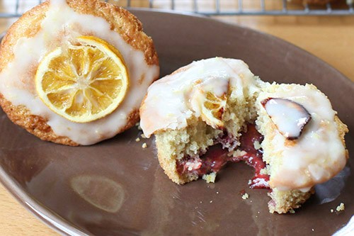 Gluten free glazed Meyer lemon muffins filled with slow roasted balsamic red wine strawberry jam