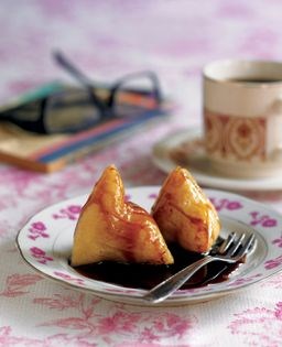 Glutinous rice dumplings served with sweet sauce (Kueh chang abu)