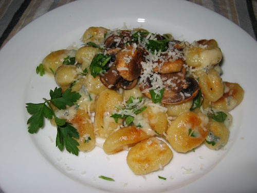 Gnocchi in a Gorgonzola sauce topped with fried mushrooms