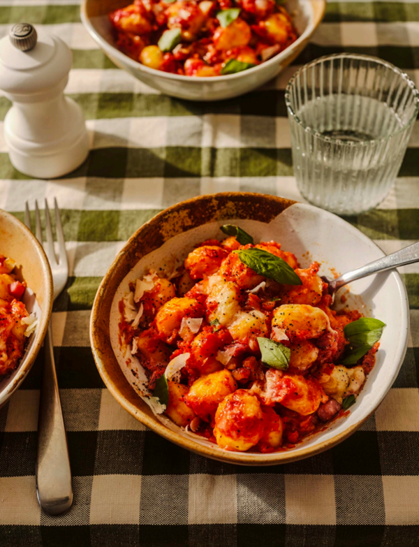 Gnocchi in pancetta, tomato and Parmesan sauce (Gnocchi in salsa di pomodoro con pancetta e Parmigiano)