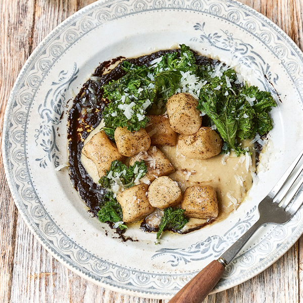 Gnocchi, onion purée, kale and black garlic