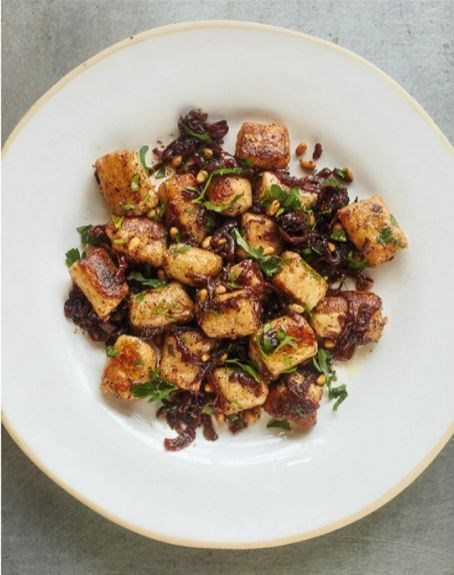 Gnocchi with sumac onions and brown butter pine nuts