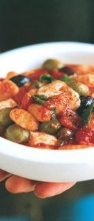 Gnocchi with tomato, olives and garlic confit